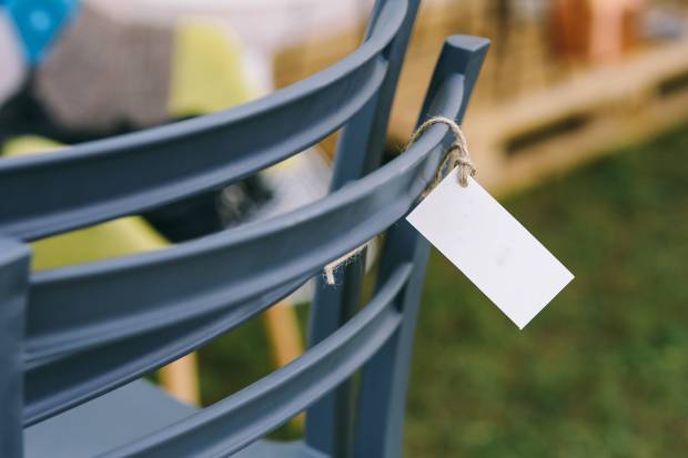 kaboompics_Close-up of a back of a chair with a tag